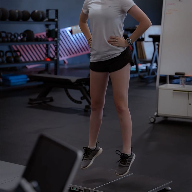 Young woman jumping at Speed Mechanics
